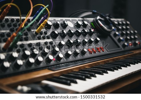 Analog synthesizer board in sound recording studio.Professional hi-fi audio equipment for music producer.Retro analog synth device for producing new musical tracks in high quality Сток-фото © 