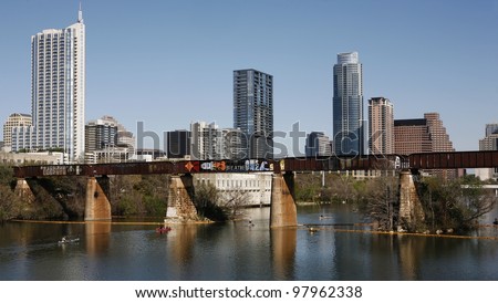 AUSTIN, TEXAS - MAR 9: SXSW 2012 South by Southwest 2012 Annual music, film, and interactive conference and festival on March 9, 2012 in Austin, Texas. Festival is held from March 9-18. Austin Skyline, Colorado River and railway bridge