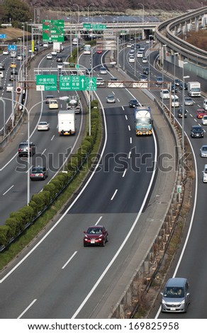 SUITA, JAPAN - APRIL 3: Chugoku Expressway, one of the busiest highways in Japan on April 3, 2011 in Suita. It connects Kansai and Chugoku including major cities of Hiroshima, Kobe, and Osaka.