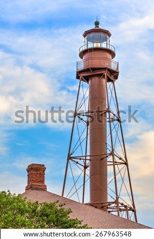 The metal Sanibel Island Lighthouse, or Ybel Light, was built on the isle\'s east end to mark the entrance to San Carlos Bay and the port of Punta Rassa, near Fort Meyers, Florida.