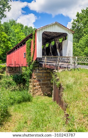 Also known as the Hildreth Covered Bridge or Lafaber\'s Mill Bridge, the historic Hills Covered Bridge crosses the Little Muskingum River in Washington County, Ohio.