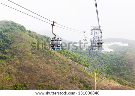 HONG KONG - APRIL 10: cable car ride to Lantau Island in Hong Kong on April 10 2011. Lantau is the largest island in Hong Kong, located at the mouth of the Pearl River.