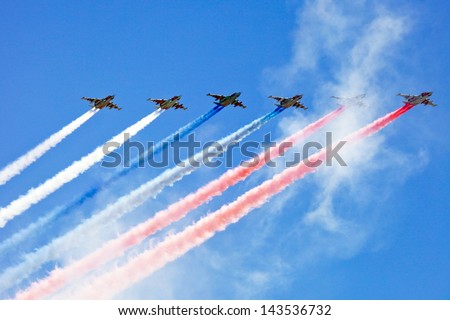 MOSCOW - MAY 09: Air parade on Red Square, Moscow during Victory Day on May 9, 2013 in Moscow, Russia.