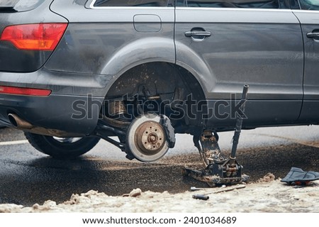 Similar – Image, Stock Photo Car stoped on the road with view of typical rural Icelandic Church with red roof in Vik region. Iceland
