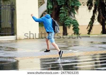 Similar – Image, Stock Photo Unrecognizable man on wet beach
