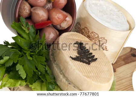 Small portion of goat cheese flavored with herbs and spices