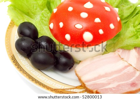 funny food - mushroom is made from an egg, tomato and mayonnaise isolated on white