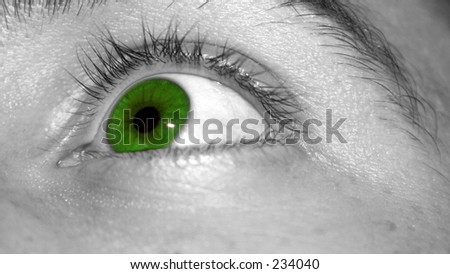 Man\'s green eye looking up