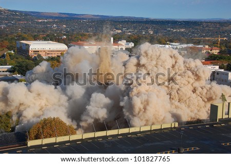 Building demolition by implosion - image 10 of a 10 shot sequence