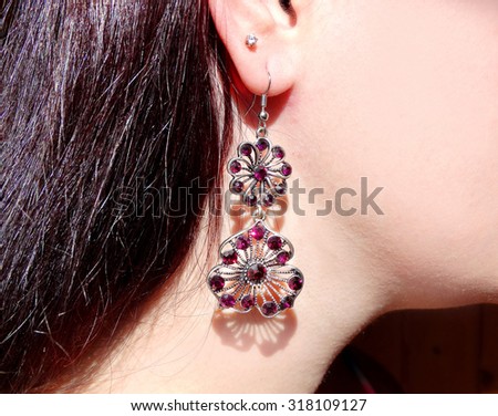 earrings jewelry with crystals in ear