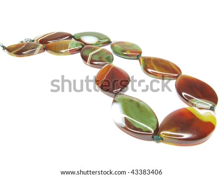red and green agate beads  isolated on white