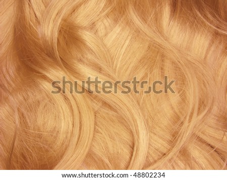 wheat colored hair curls as texture background