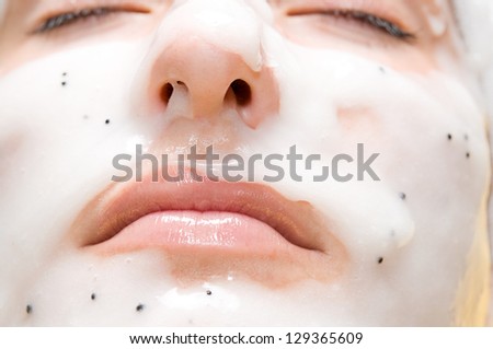 Close-up of a woman with beauty mask on her face