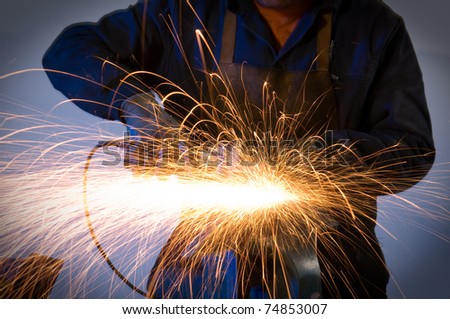 Cutting metal causing sparks isolated - a series of METAL INDUSTRY images.