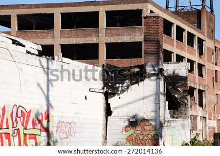 DETROIT, MI-CIRCA JANUARY 2015:  Abandoned auto factory in Detroit awaits the wrecking ball.  Detroit recently received a grant to help offset the demolition costs of their abandoned buildings.