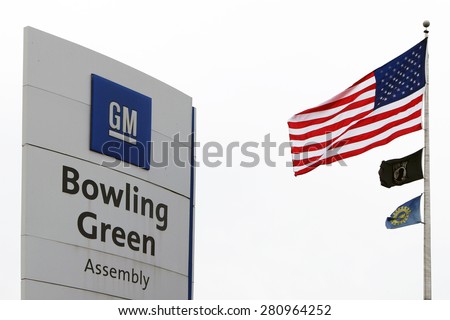 BOWLING GREEN, KY-MAY, 2015:  Sign for the Chevrolet Corvette assembly plant in Bowling Green, KY with an adjacent American flag.  This is the only Corvette plant in the world.