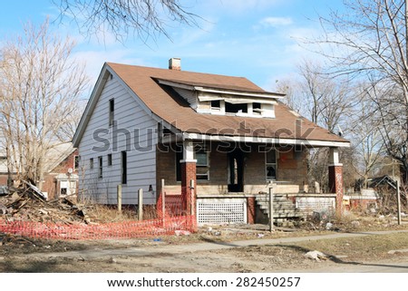 DETROIT, MI-MAY, 2015:  Abandoned and damaged single family home near downtown Detroit.