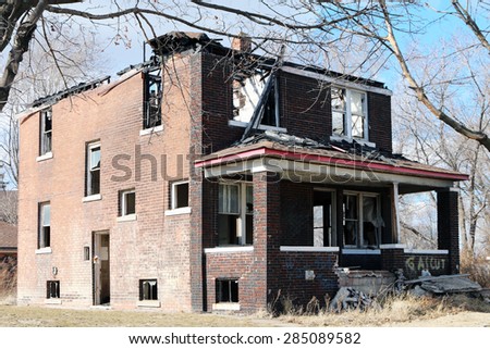 DETROIT, MI-MAY, 2015:  One of thousands of empty and abandoned houses in Detroit.  This was considered a luxury home many years ago.