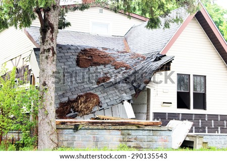Old home where the roof has collapsed.