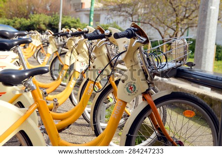 MILAN, ITALY - APRIL 03: Milan city bikes parking on April 03, 2015 in Milan, Italy.