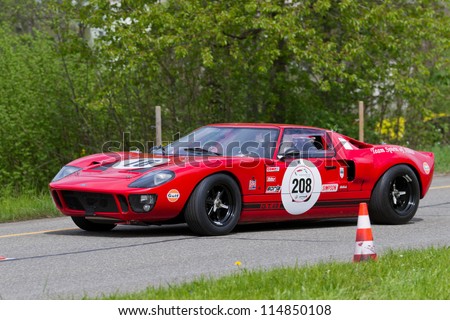 MUTSCHELLEN, SWITZERLAND-APRIL 29: Vintage race touring car Ford GT 40  from 1969 at Grand Prix in Mutschellen, SUI on April 29, 2012.  Invited were vintage sports cars and motorbikes.