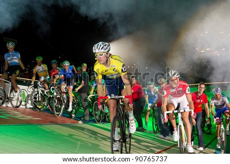 ZURICH-NOV. 30:  Official start with shot and smoke of bike event Sixday-Nights Z?rich 2011 at Zurich Hallenstadion November 30, 2011 in Zurich SUI. First race madison style for professionals.