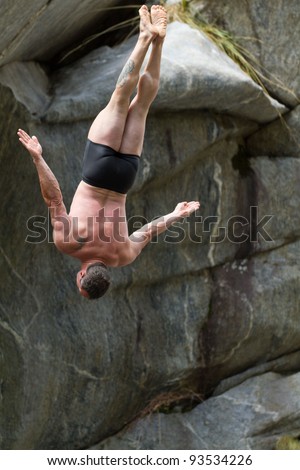 LOCARNO - JULY 23: Cliff diving athlete Andy Hulliger competes in the WHDF European Championship 2011 with dives from up to 20m high at Ponte Brolla July 23, 2011 in Locarno, Switzerland.
