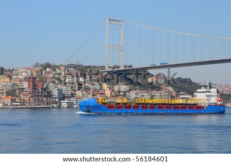 pylon of Bosporus suspension bridge  connecting Asia with Europe above the Bosporus  towering over a neighborhood  near Istanbul, Turkey Stok fotoğraf © 