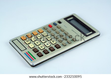 Old calculator tool. Vintage calculator.
