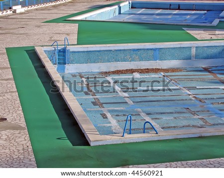 swimming pool out of season. swimming pool. empty swimming pool.