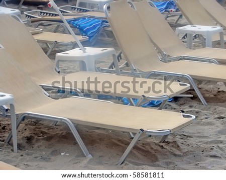 beach cafe. umbrellas and sunbeds on the beach.