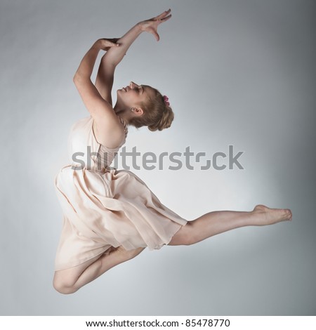 A graceful girl in jump