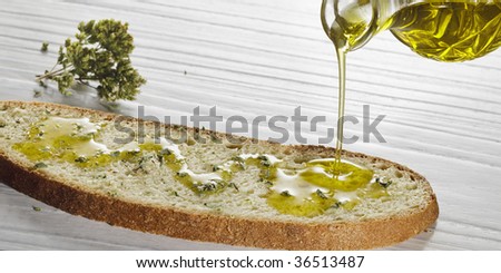 slice of bread seasoned with olive oil and oregano