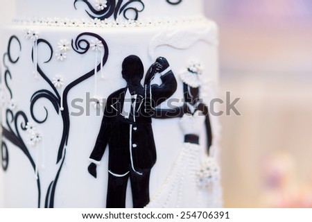 Cute bride and groom wedding cake