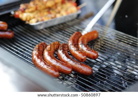 Delicious fresh grilled sausages ready to serve