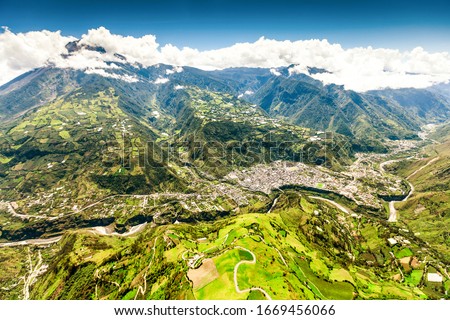mountain town from aerial shot of banos de agua santa nne to sww tungurahua volcano in the background and pastaza river in foreground mountain town from volcanoe volcano building canyon vacation earth Stock fotó © 