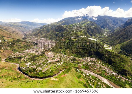 banos de agua santa aerial shot from nne pastaza river in the foreground and tungurahua volcano in the background volcanoe building canyon holiday earth active outdoor exploration ecuador outside land Stock fotó © 