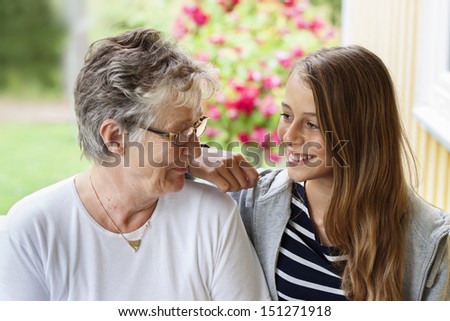 Grandmother and grandchild looking at each other