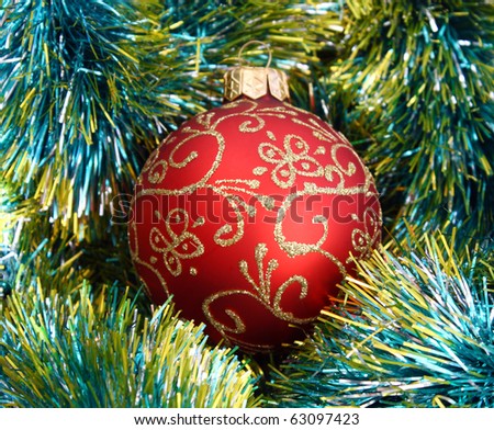 close-up christmas ornate ball and garland