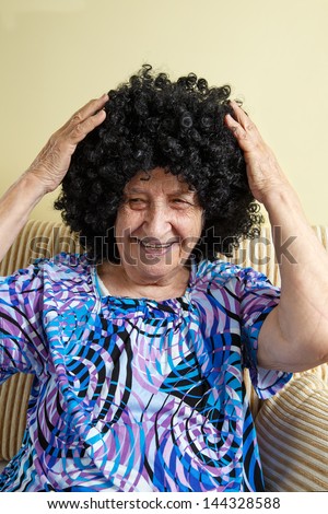 senior woman wearing black wig