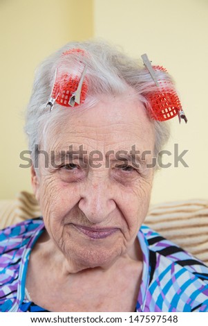 senior woman hair dressing