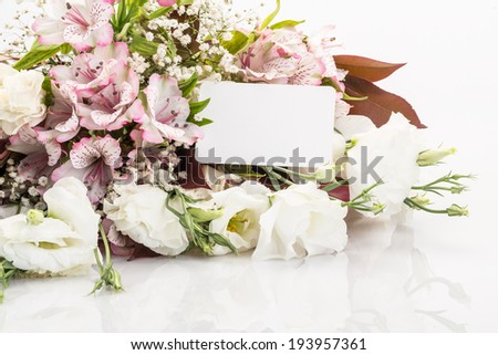 bouquet of flowers with name tag on