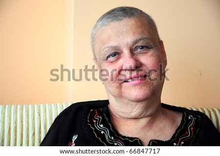 bald (short hair cut) woman