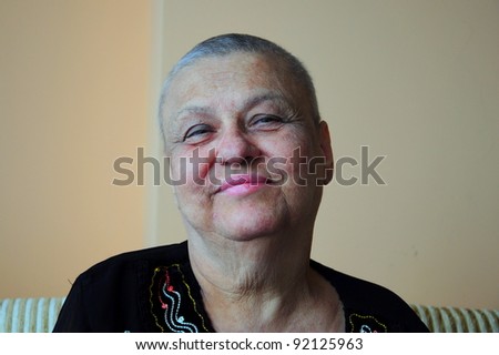 portrait of a bald woman who has chemotherapy