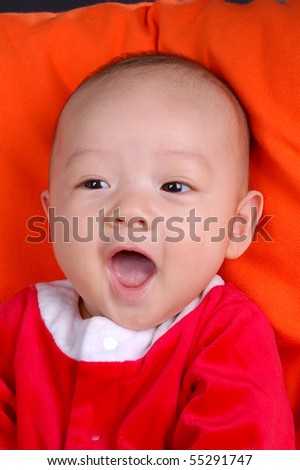 The Chinese infant baby laughing with great fun