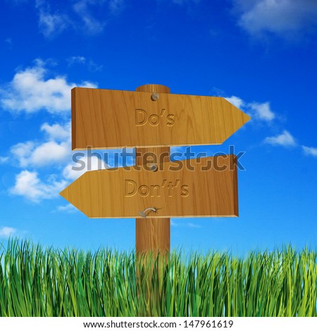 Rule concept with do\'s and don\'ts on wooden sign board