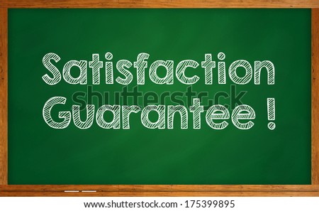 Satisfaction guarantee written on chalkboard