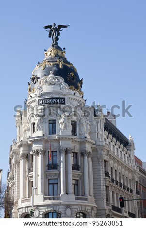 MADRID, FEBRUARY 12 - Metropolis building of the insurance company of the same name, in the Gran Via in Madrid, Spain on February 12, 2012. Is famous for its winged statue.