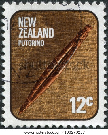 NEW ZEALAND - CIRCA 1976: A stamp printed in New Zealand shows Maori Artifacts: Putorino, carved flute, circa 1976
