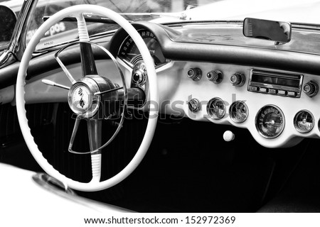 BERLIN - MAY 11: The driver\'s seat sports car Chevrolet Corvette 1954 (C1), black and white, 26th Oldtimer-Tage Berlin-Brandenburg, May 11, 2013 Berlin, Germany